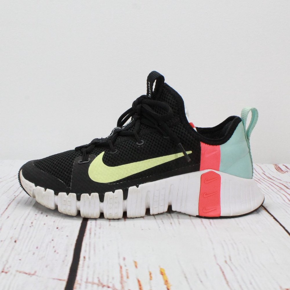 Nike Women's Black Sneakers with Light Green Swoosh and Coral Mint Accents
